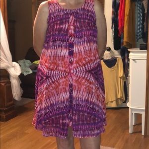 Dress with attached overlay